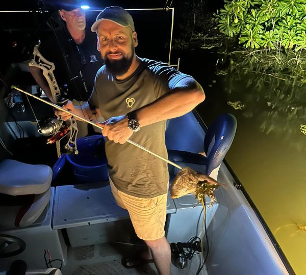 Fishing at Bolgoda Lake with Bowfishing Lanka.